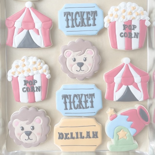 Image of sugar cookies design like circus animals, popcorn and tents